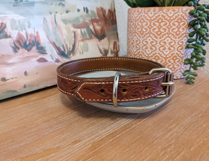 Custom brown leather dog collar with custom tooled scroll pattern. With a silver buckle.